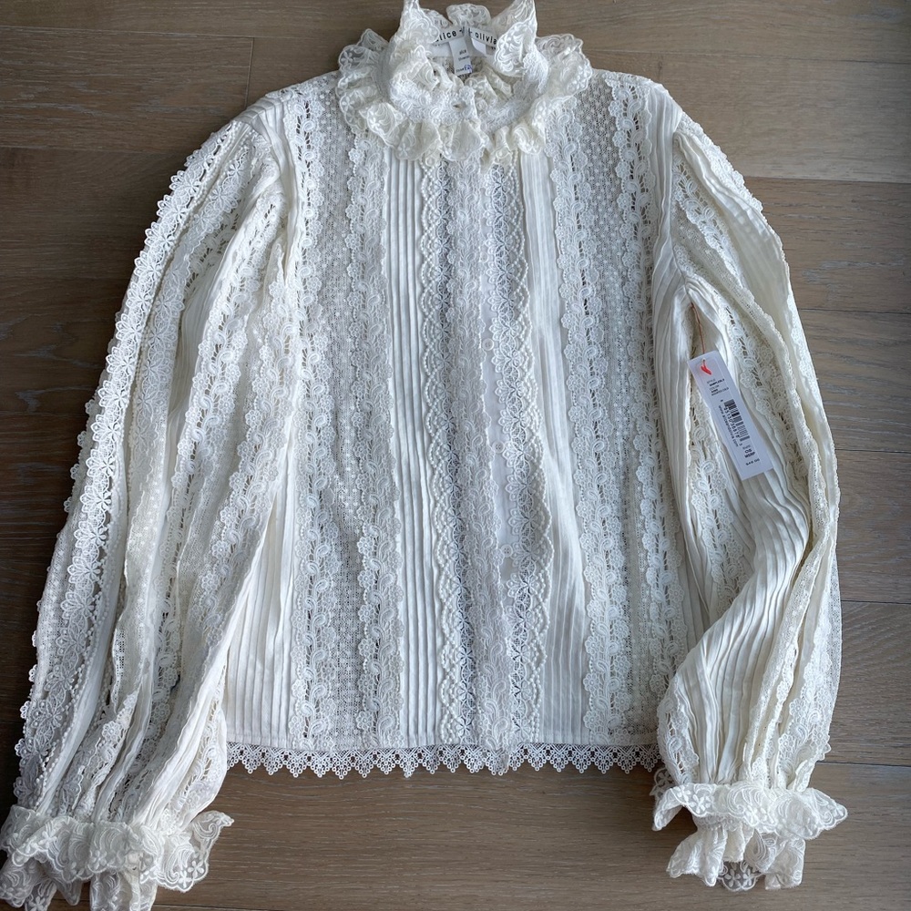 White Yvette Mock Neck Button Front Blouse.